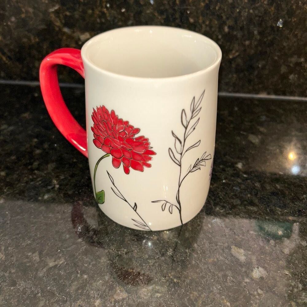 Lang by Design Group mugs with floral design.